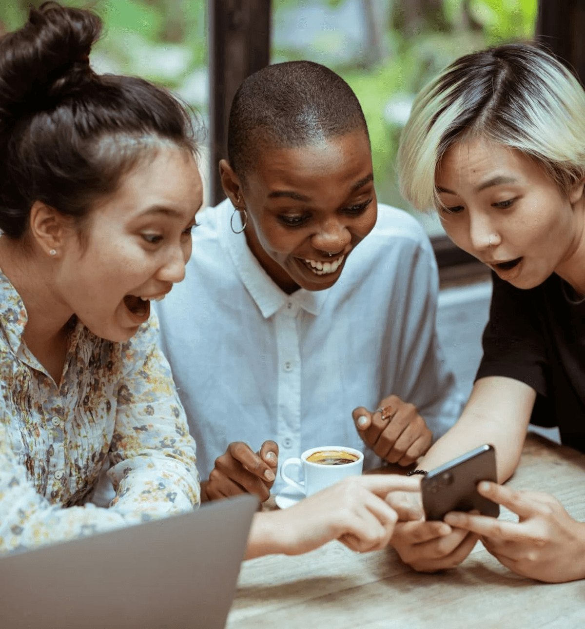 Excited people on laptop